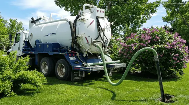 Professional vacuum truck performing residential drainage and septic maintenance in Honolulu, HI